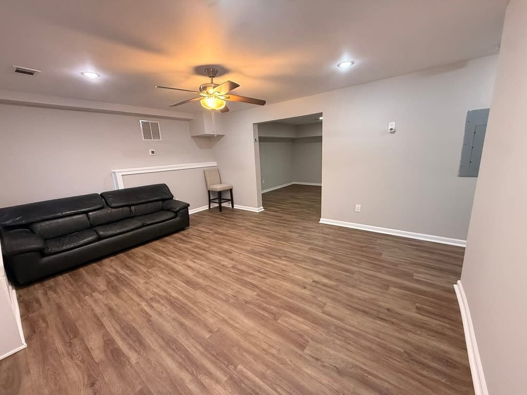 Luxury vinyl plank flooring installed in living room โ 2M Construction Huntsville AL